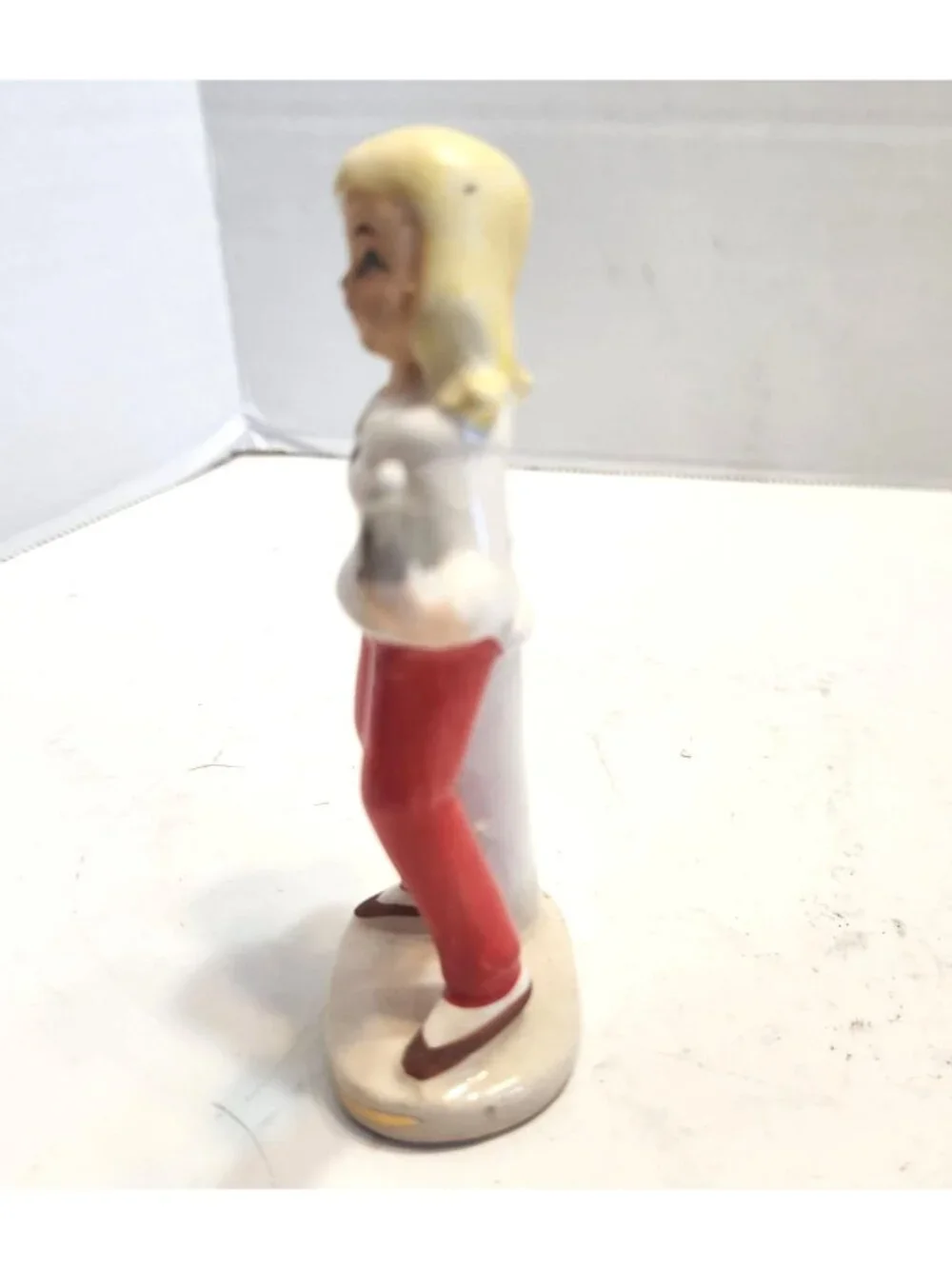 Vintage Small Ceramic Figurine Of Woman Red Pants & White Blouse with Radio READ